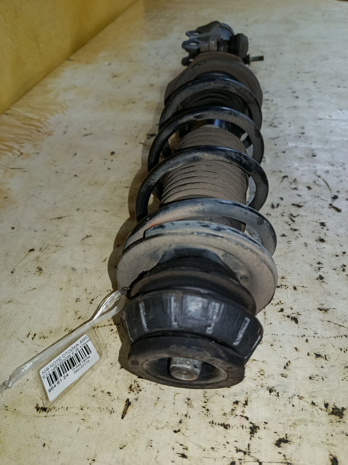 Стойка амортизатора на Nissan Note E12 HR12DDR Фото 2