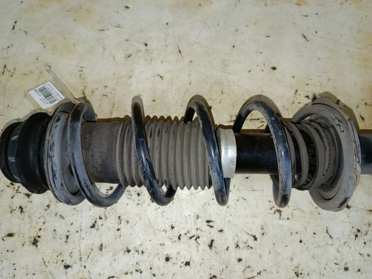 Стойка амортизатора на Nissan Note E12 HR12DDR Фото 3