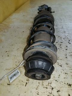 Стойка амортизатора на Nissan Note E12 HR12DDR Фото 2