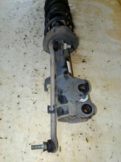 Стойка амортизатора на Nissan Note E12 HR12DDR Фото 4