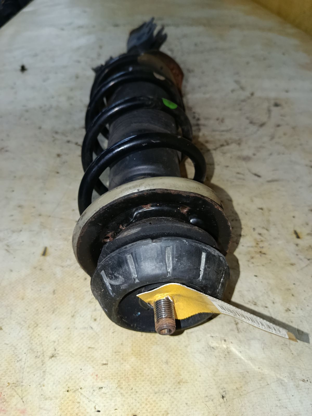 Стойка амортизатора на Nissan Note E12 HR12DDR Фото 2