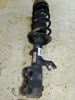 Стойка амортизатора на Nissan Note E12 HR12DDR Фото 4