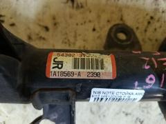 Стойка амортизатора на Nissan Note E12 HR12DDR Фото 5