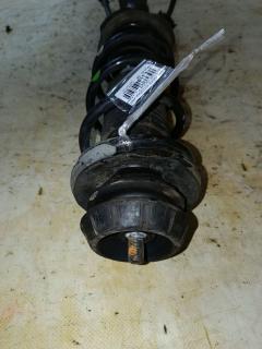 Стойка амортизатора на Nissan Note E12 HR12DDR Фото 2