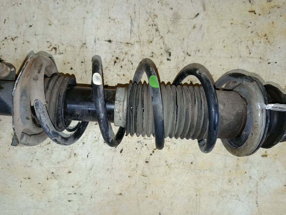 Стойка амортизатора на Nissan Note E12 HR12DDR Фото 3