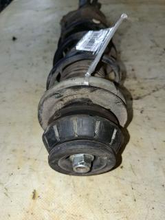 Стойка амортизатора на Nissan Note E12 HR12DDR Фото 2