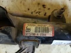 Стойка амортизатора на Nissan Note E12 HR12DDR Фото 5