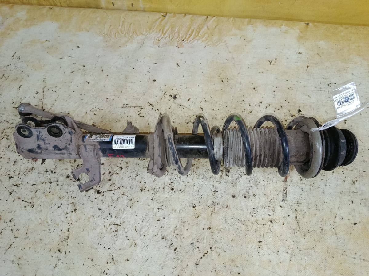 Стойка амортизатора на Nissan Note E12 HR12DDR Фото 1