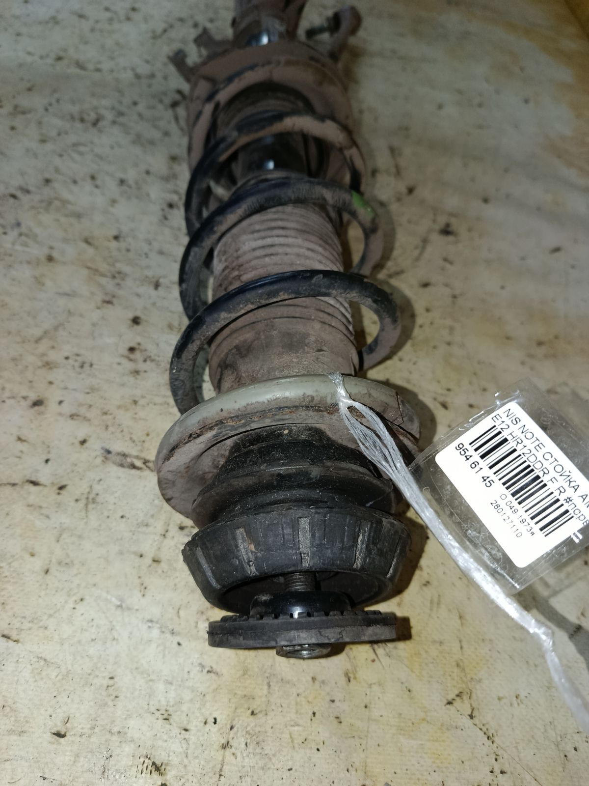 Стойка амортизатора на Nissan Note E12 HR12DDR Фото 2