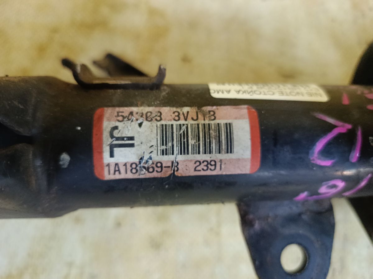 Стойка амортизатора на Nissan Note E12 HR12DDR Фото 5