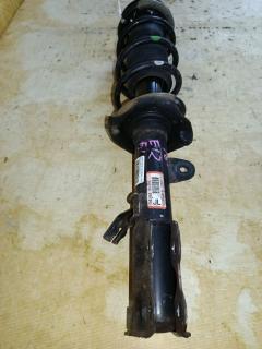 Стойка амортизатора на Nissan Note E12 HR12DDR Фото 4