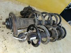 Амортизатор на Nissan Elgrand TE52 Фото 4