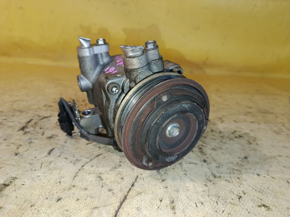 Компрессор кондиционера 95201-81P10 на Suzuki Solio MA36S K12C Фото 1