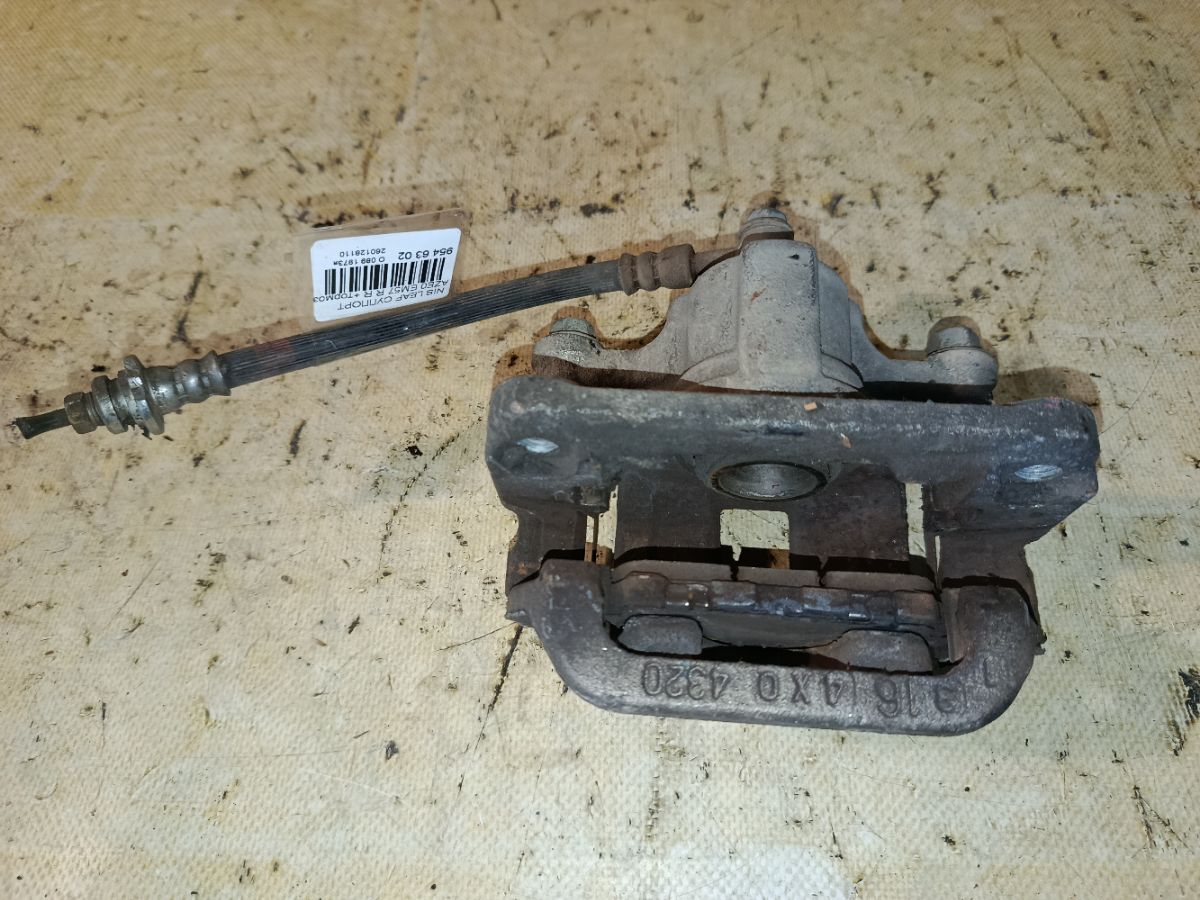 Суппорт на Nissan Leaf AZE0 EM57 Фото 1