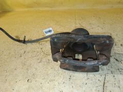 Суппорт на Toyota Voxy AZR60G 1AZ-FSE 47750-44020  47750-44021, Переднее Левое расположение