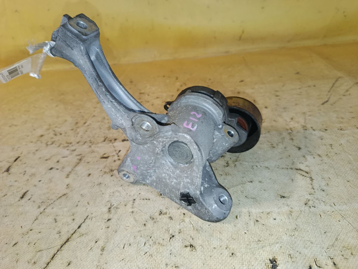 Ролик натяжной на Nissan Note E12 HR12DDR Фото 3