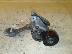 Ролик натяжной на Nissan Note E12 HR12DDR