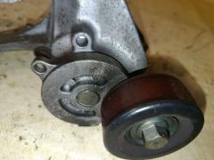 Ролик натяжной на Nissan Note E12 HR12DDR Фото 2