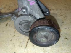 Ролик натяжной на Nissan Note E12 HR12DDR Фото 2