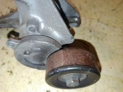 Ролик натяжной на Nissan Note E12 HR12DDR Фото 2