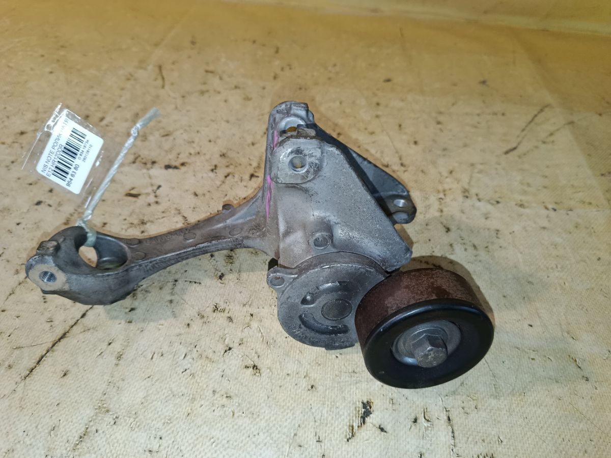 Ролик натяжной на Nissan Note E12 HR12DDR Фото 1