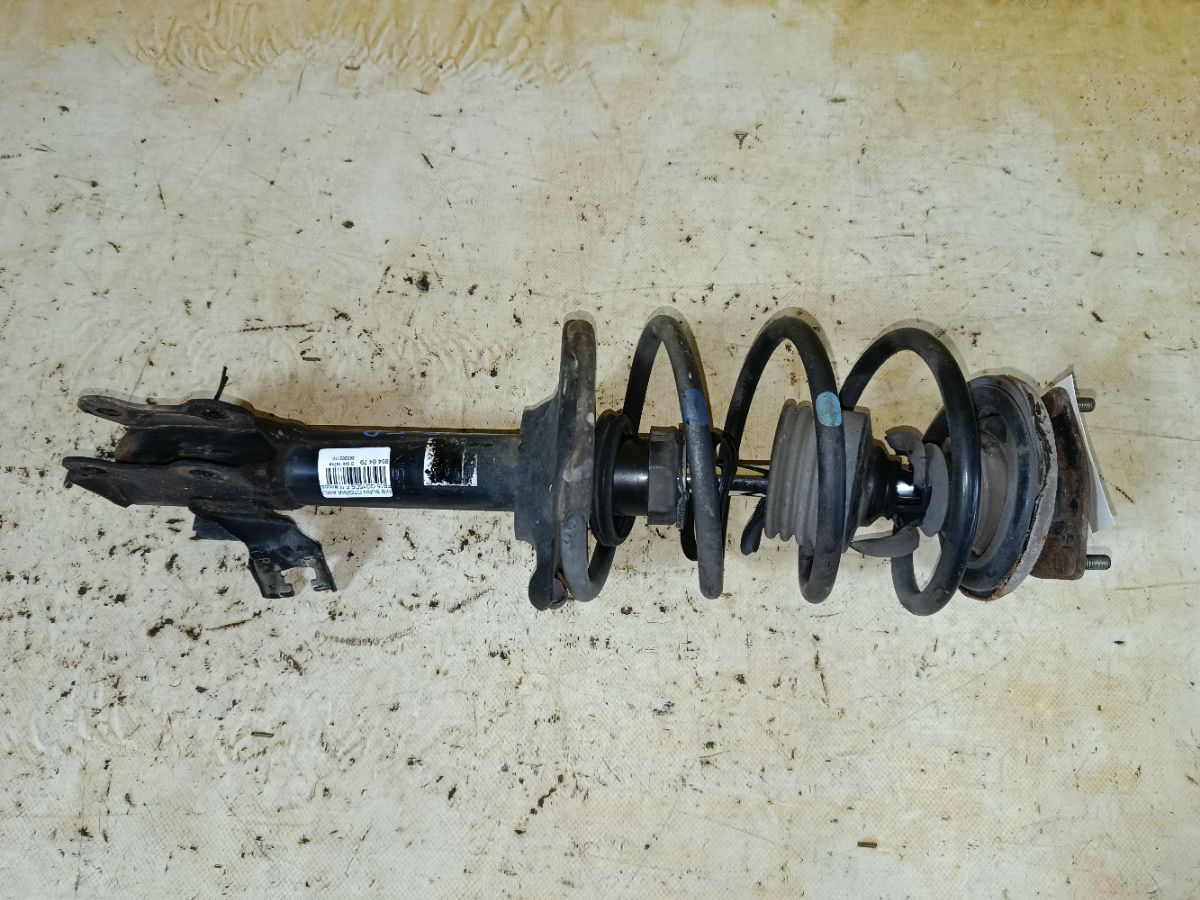 Стойка амортизатора на Nissan Sunny FB15 QG15DE Фото 1