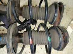 Стойка амортизатора на Toyota Avensis AZT250 1AZ-FSE Фото 3