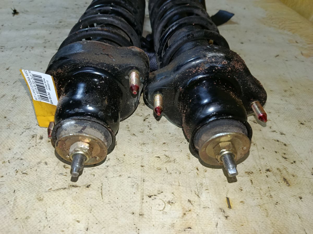 Стойка амортизатора 341342, MR519006, MR554527, ST-049-2147, ST-049R-CS2A на Mitsubishi Lancer Cedia CS2A 4G15 Фото 2
