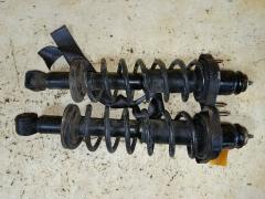 Стойка амортизатора на Mitsubishi Lancer Cedia CS2A 4G15 341342  MR519006  MR554527  ST-049-2147  ST-049R-CS2A, Заднее расположение