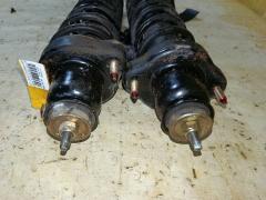 Стойка амортизатора 341342, MR519006, MR554527, ST-049-2147, ST-049R-CS2A на Mitsubishi Lancer Cedia CS2A 4G15 Фото 2