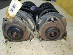 Стойка амортизатора на Mitsubishi Lancer Cedia CS2A 4G15 Фото 2