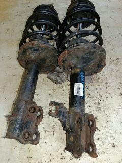 Стойка амортизатора на Nissan Bluebird Sylphy QNG10 QG18DE Фото 4