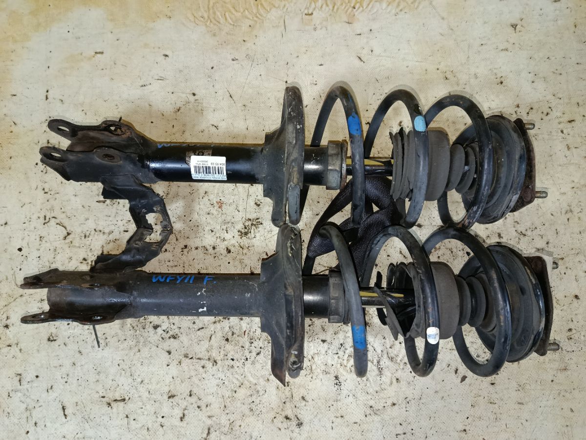 Стойка амортизатора на Nissan Wingroad WFY11 QG15DE Фото 1