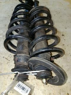 Амортизатор на Mitsubishi Grandis NA4W Фото 2