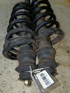 Амортизатор на Mitsubishi Grandis NA4W Фото 2