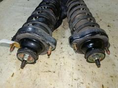 Стойка амортизатора 19-063386, 230 003, 30-A21-A, 341140, 441085, CR-049-9745, CR-049R-CJ1A, CR8994, MB809270, MB809271, MB809272, MB871321, MB871322, MB910844, MB911185, MB911186, MB914897, MR197611, MR244447, MR244448, MR403040, MR455762, PW531064, Q2957, SJ-049-9745, SJ-049R-CJ1A, ST-049-9745, ST-049R-CJ1A, U2957 на Mitsubishi Lancer CK2A 4G15 Фото 2