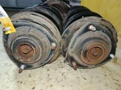 Стойка амортизатора на Mitsubishi Grandis NA4W 4G69 Фото 2