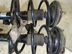 Стойка амортизатора на Mitsubishi Grandis NA4W 4G69 Фото 3