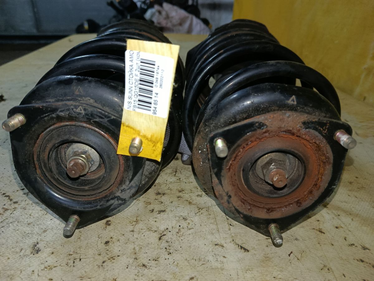 Стойка амортизатора на Nissan Sunny FB15 QG15DE Фото 2