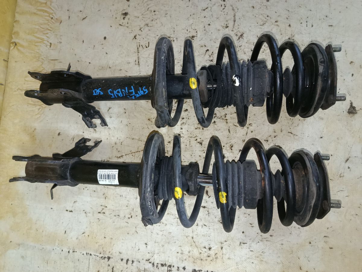 Стойка амортизатора на Nissan Sunny FNB15 QG15DE Фото 2