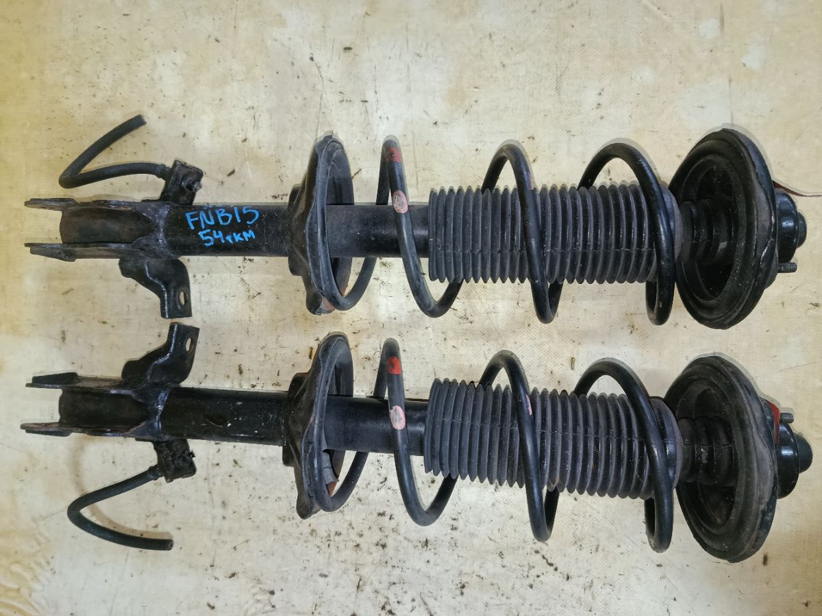 Стойка амортизатора на Nissan Sunny FNB15 QG15DE Фото 6