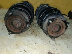 Стойка амортизатора на Nissan Sunny FNB15 QG15DE Фото 3