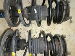 Стойка амортизатора на Nissan Sunny FNB15 QG15DE Фото 4