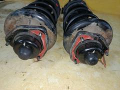 Стойка амортизатора на Nissan Sunny FNB15 QG15DE Фото 7