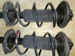 Стойка амортизатора на Nissan Sunny FNB15 QG15DE Фото 8