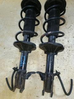 Стойка амортизатора на Nissan Sunny FNB15 QG15DE Фото 9