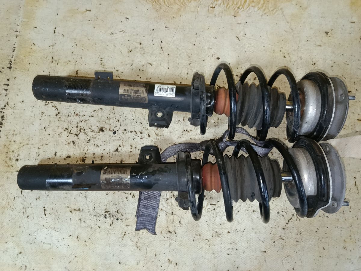 Стойка амортизатора 3131677291802, 3131677291702 на Bmw 3-Series E91-VW72 N46 Фото 1