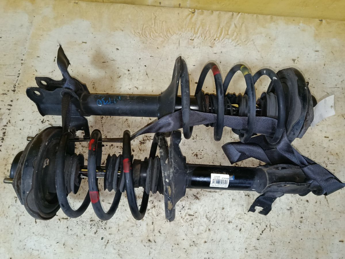 Стойка амортизатора на Nissan X-Trail NT30 QR20DE Фото 1