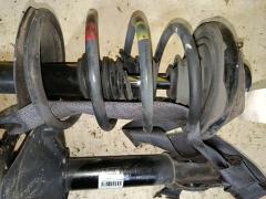 Стойка амортизатора на Nissan X-Trail NT30 QR20DE Фото 3