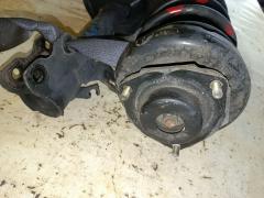 Стойка амортизатора на Nissan X-Trail NT30 QR20DE Фото 5